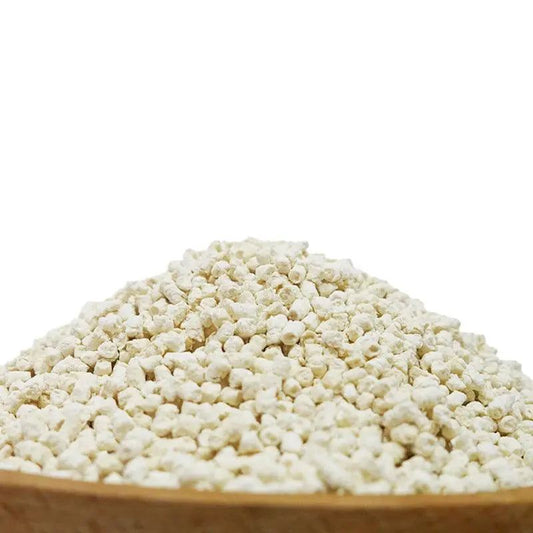 Close-up of Tofu Fresh Scented Space Litter granules for cat litter with milk fragrance and natural ingredients