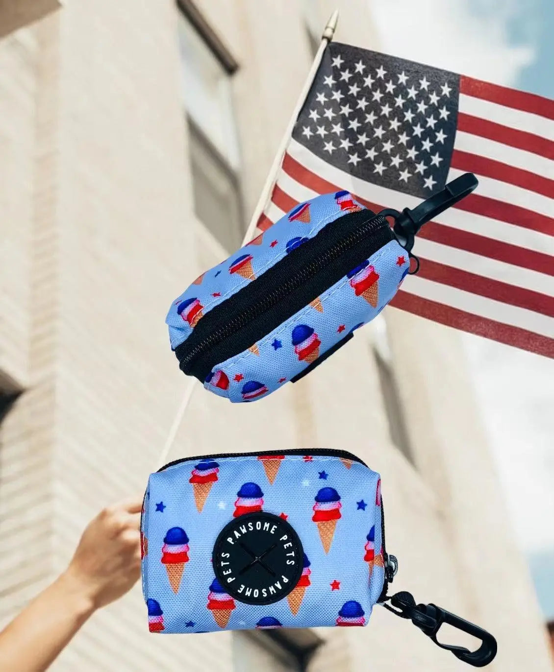 Blue neoprene waste bag holder with ice cream design and black clasp clip