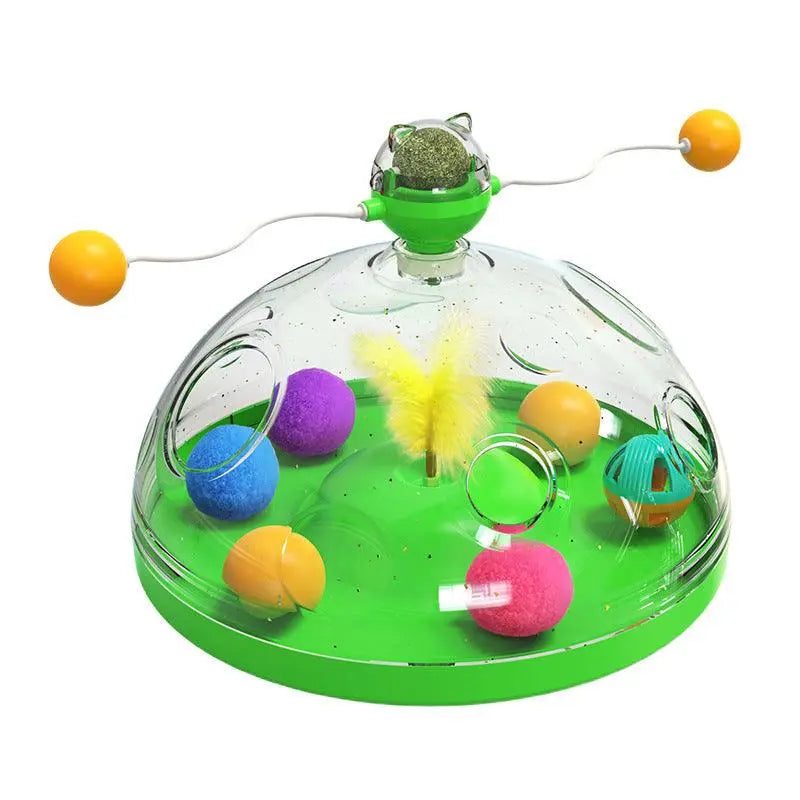Whisker Wonderland interactive cat toy with catnip ball, teaser sticks, colorful balls, and feathers in a transparent dome.