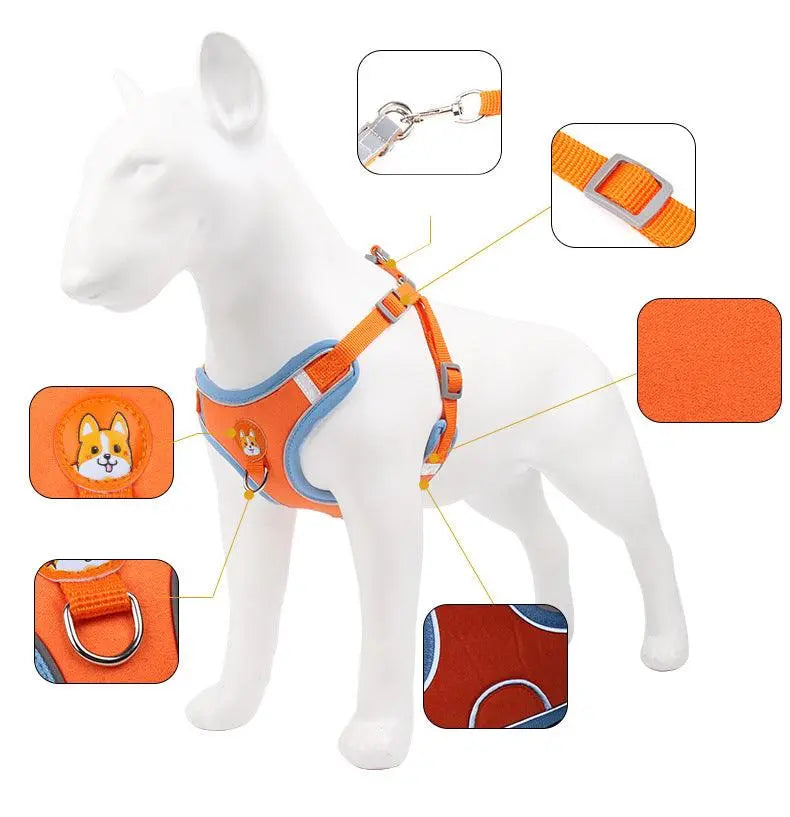 Reflective breathable orange pet harness with adjustable straps and secure leash clip on dog mannequin