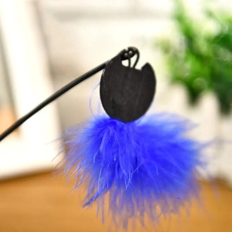 blue interactive feathered pet tumbler toy with black pole and vibrant feathers for cats