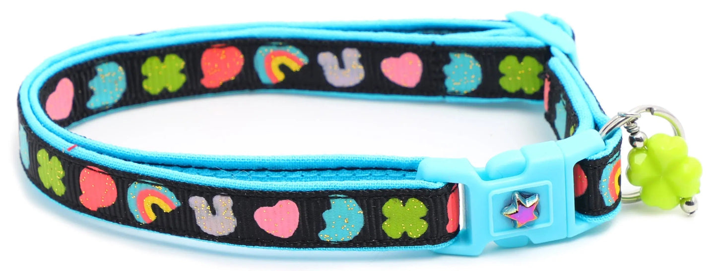 Cereal Marshmallows Breakaway Collar for cats with reinforced cotton, light blue buckle, and colorful charm designs.